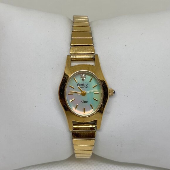 Armitron Diamond women gold tone watch 19mm oval case mop dial quartz running - Picture 1 of 7